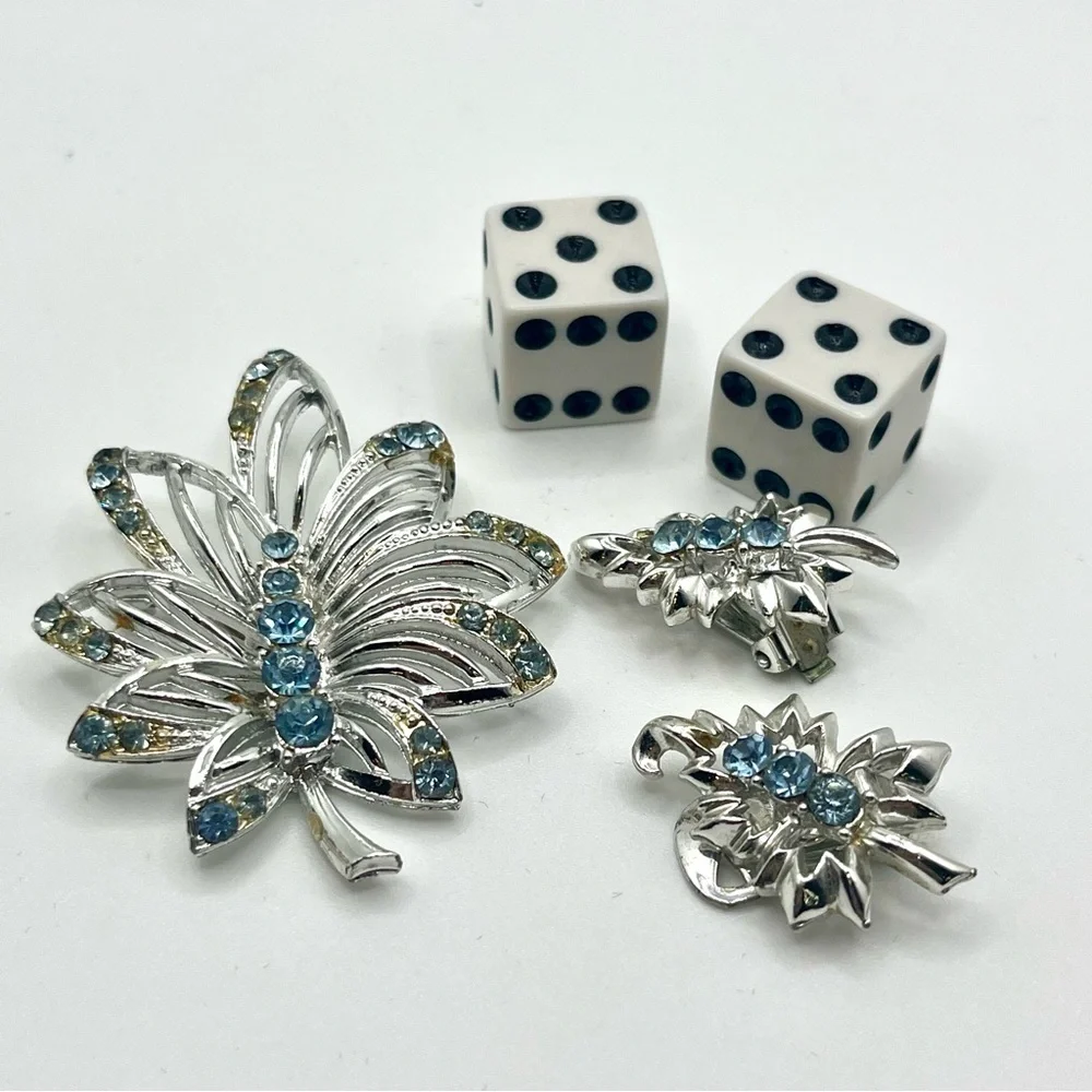 Vintage blue rhinestone butterfly brooch with matching clip earrings silver tone